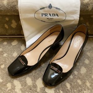Black patent with Prada logo on top bar